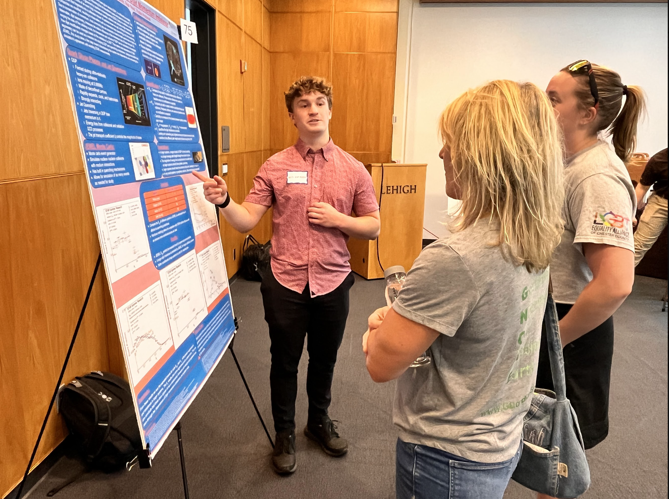 Van Rossum explains his research to attendees at the Summer Research Expo.